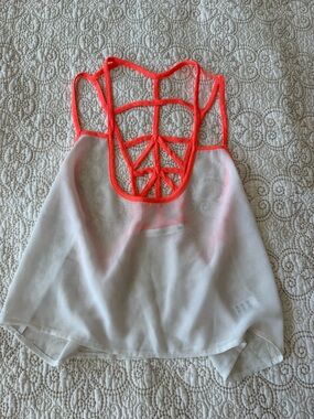 White sheer strappy back crop top with neon coral details